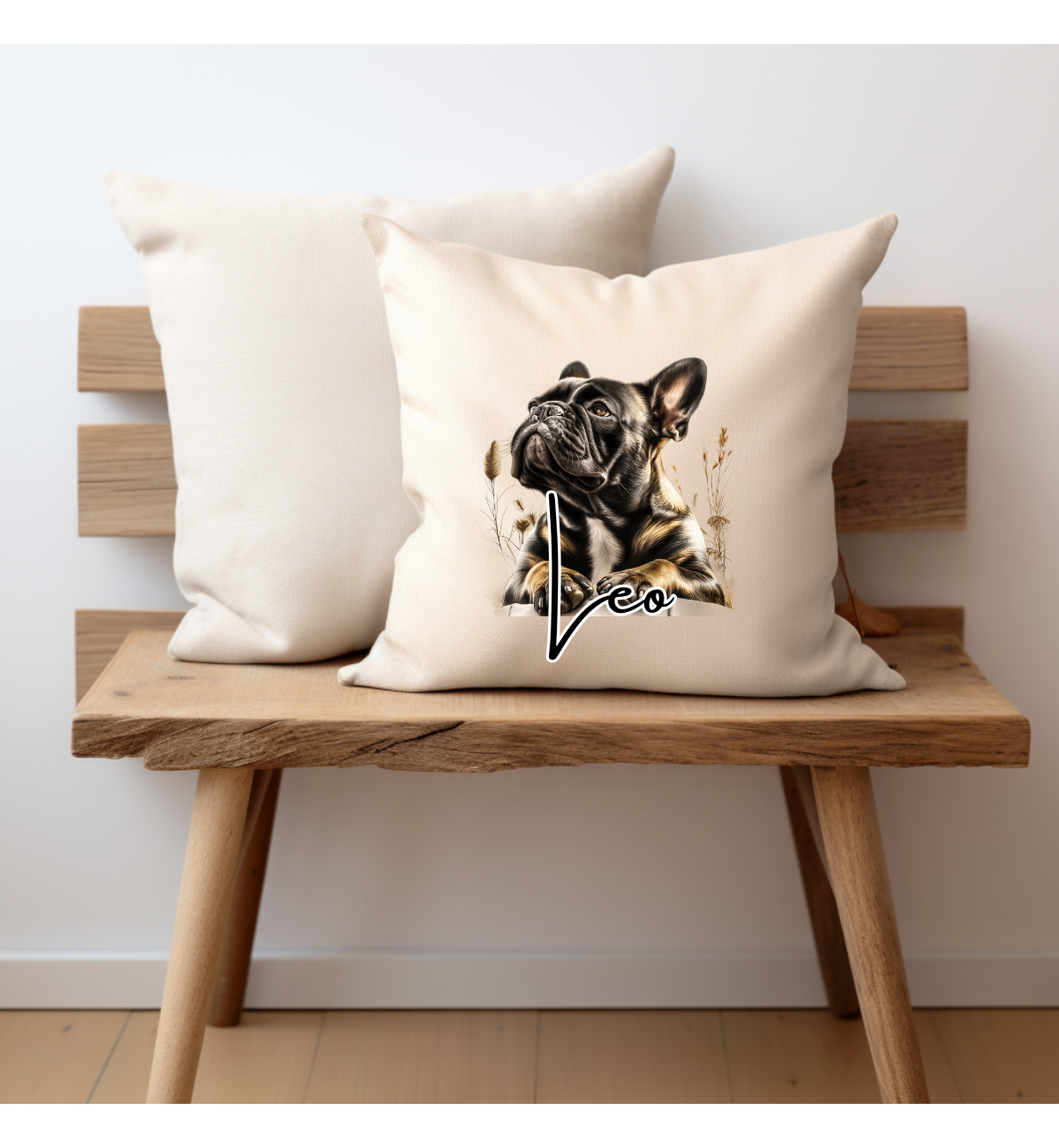 A brindle French bulldog printed onto oneside of a cream cushion and personalised with a name