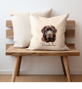 Brown newfoundland dogprinted onto a cream cushion cover and personalised with a name ,