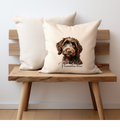 A cream coloured Cushion cover printed on one side with a detailed cockerpoo dog and personalised with a name ,zip opening, the pet printing company