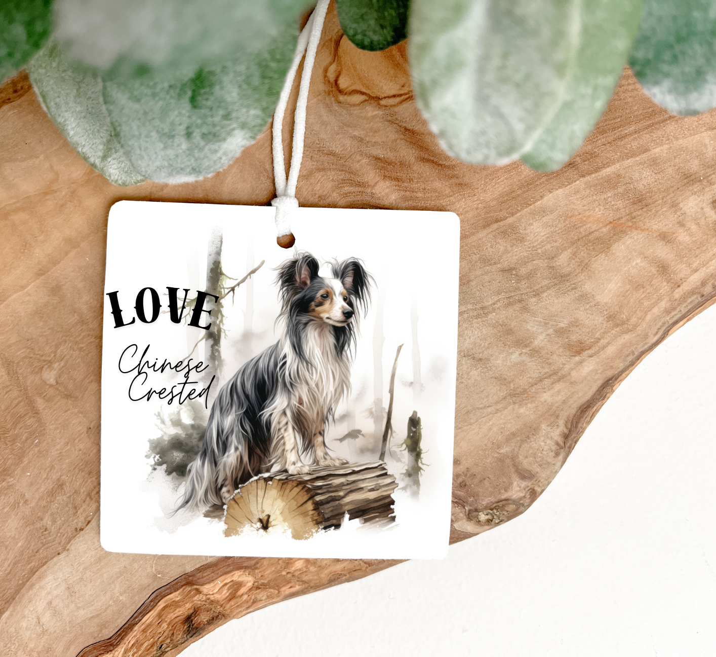 Decorative Air Freshener with a Chinese Crested dog illustration and 'LOVE' printed both sides with a decretive ribbon