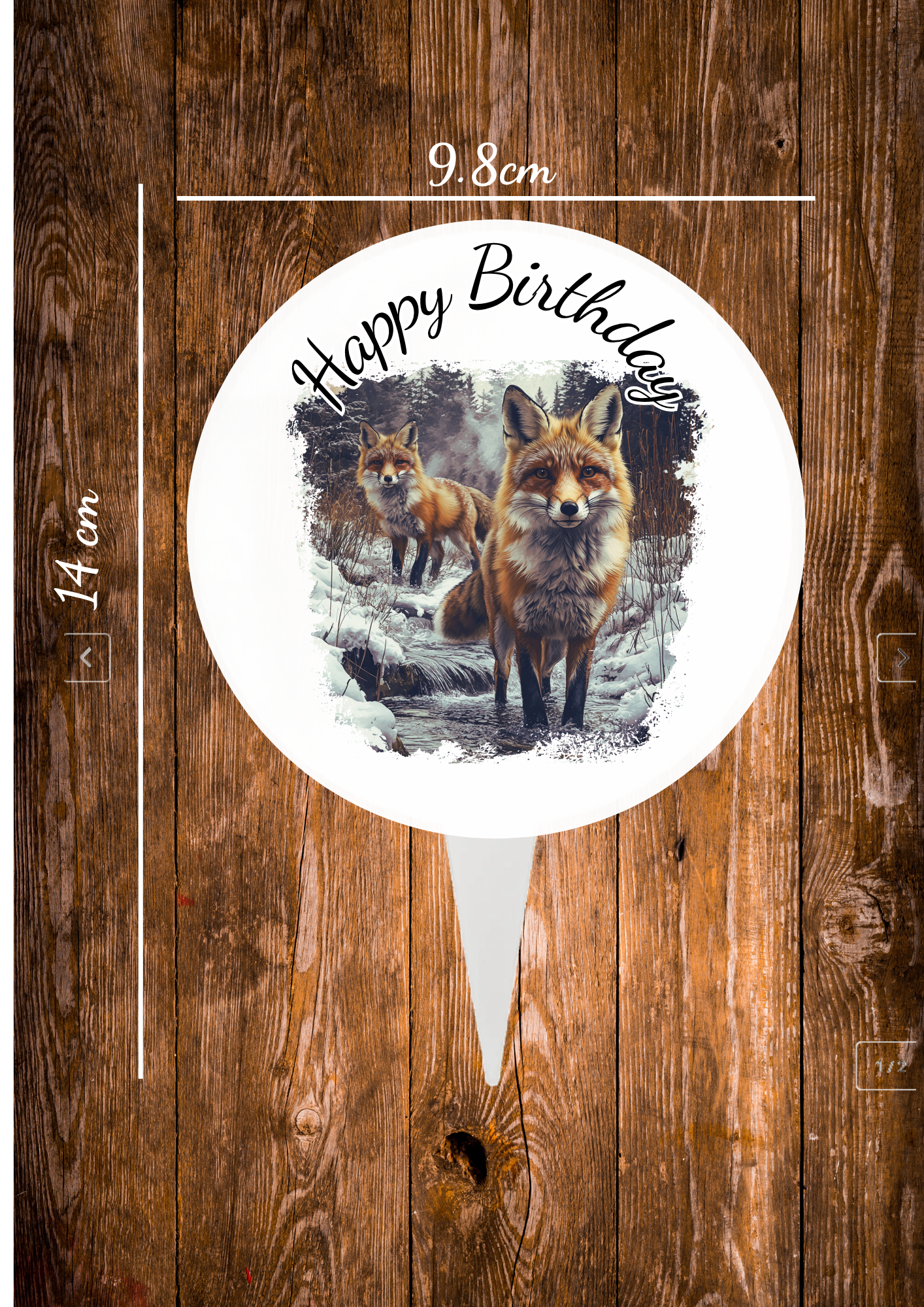 A Aluminium Cake Topper with the design on one side and a silver smooth back ,the text says happy birthday and shows some wild foxes on