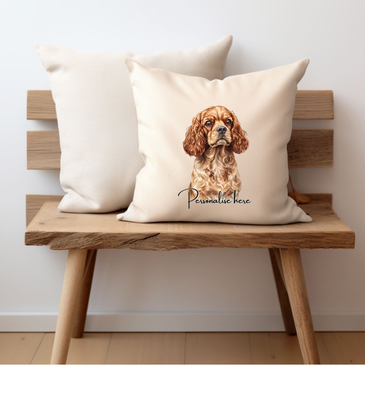 A ruby king Charles cavalier dog printed onto one side of a cream cushion cover with a personalised name