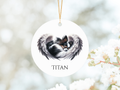 Tri Long haired chihuahua dog  asleep with angel wings printed onto a round aluminium ornament and personalised with a name on both sides the ornament has a random coloured ribbon and is 7 cm diameter